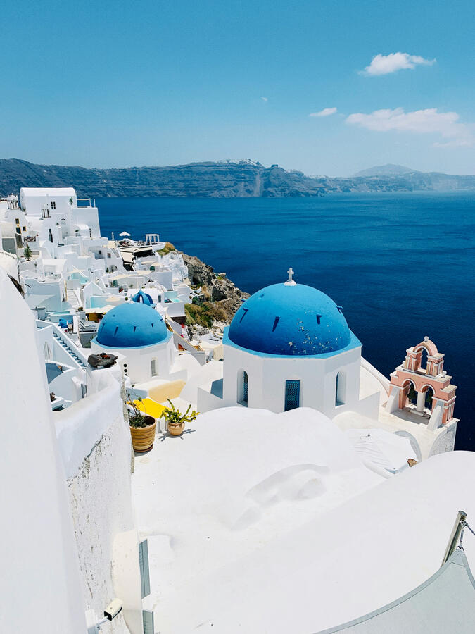 Blue domed churches in Santorini Greece